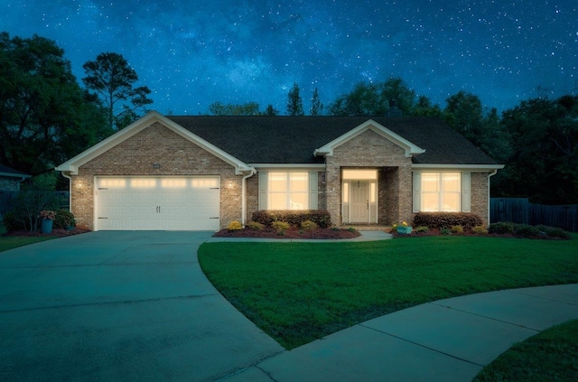 4516 Cavendish Ct, Tallahassee, FL 32309 - view of front of property with an attached garage, driveway, and brick siding
