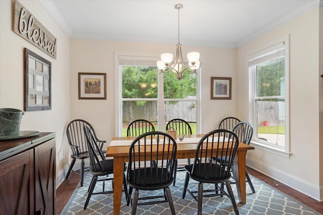 4516 Cavendish Ct, Tallahassee, FL 32309 - dining space with plenty of natural light, dark wood-type flooring, a chandelier, and ornamental molding