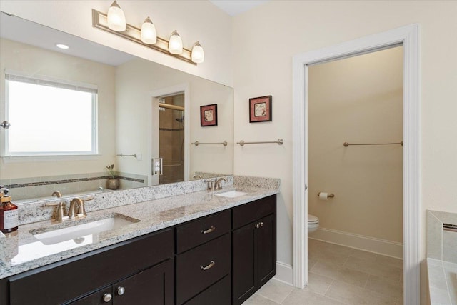 4516 Cavendish Ct, Tallahassee, FL 32309 - bathroom featuring a bath, double vanity, tile patterned floors, and a tile shower