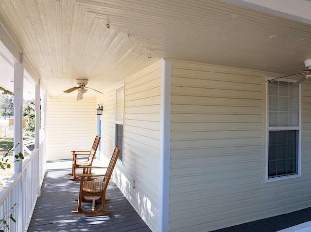 deck featuring a porch and ceiling fan