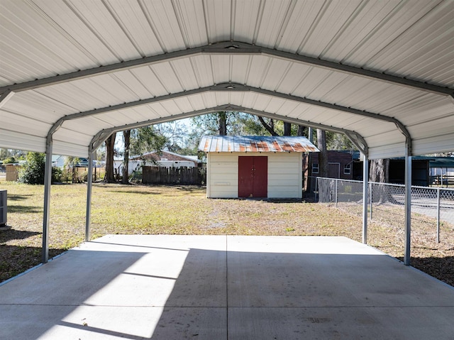 view of parking featuring a lawn and a carport