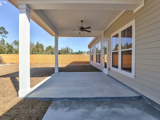view of patio featuring ceiling fan and a fenced backyard