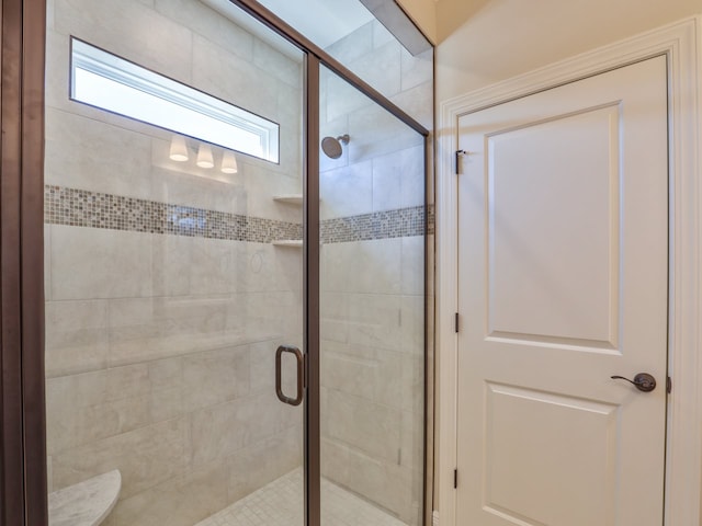 bathroom featuring a stall shower