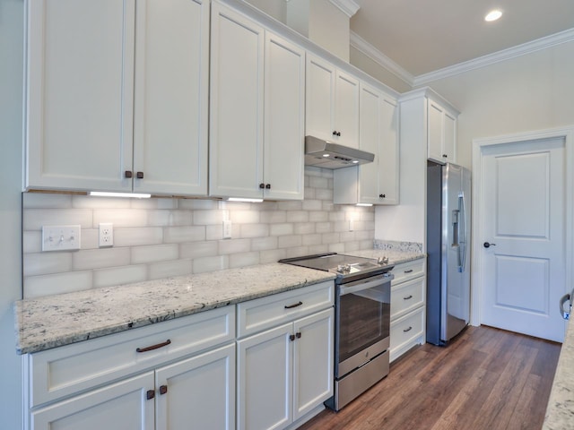 kitchen with tasteful backsplash, stainless steel appliances, under cabinet range hood, white cabinets, and crown molding