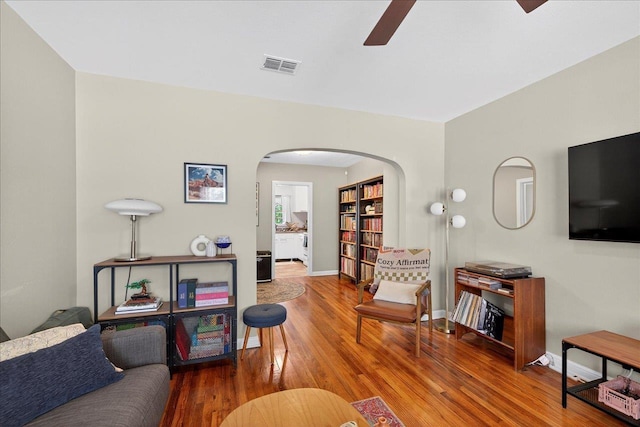 1454 S Gadsden St -, Unit Tallahassee, FL 32301 - living room with a ceiling fan, arched walkways, and wood finished floors