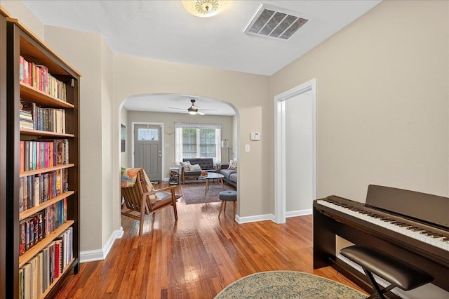 1454 S Gadsden St -, Unit Tallahassee, FL 32301 - hallway with arched walkways and wood finished floors