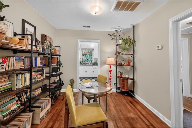 1454 S Gadsden St -, Unit Tallahassee, FL 32301 - home office featuring baseboards and wood finished floors