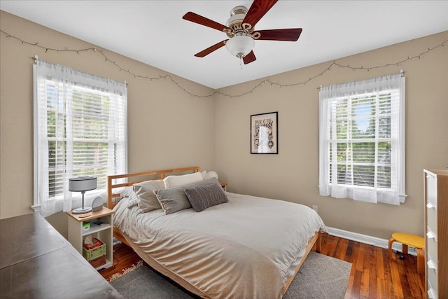 1454 S Gadsden St -, Unit Tallahassee, FL 32301 - bedroom featuring multiple windows, wood finished floors, and a ceiling fan
