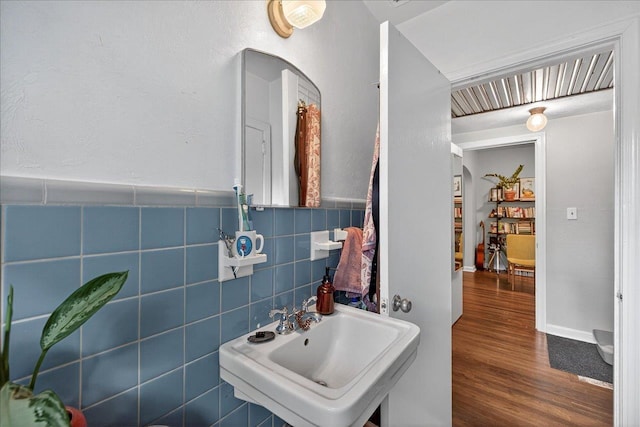 1454 S Gadsden St -, Unit Tallahassee, FL 32301 - bathroom with wood finished floors, tile walls, and wainscoting
