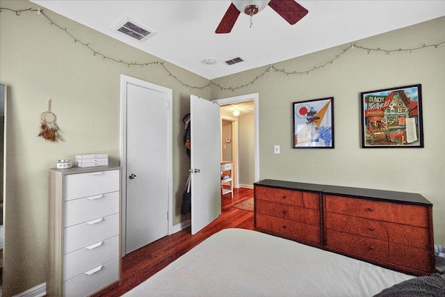 1454 S Gadsden St -, Unit Tallahassee, FL 32301 - bedroom featuring a ceiling fan and dark wood-style flooring