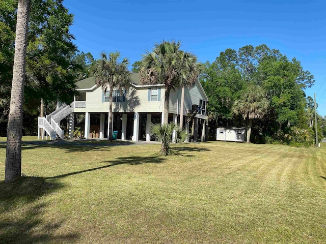 exterior space featuring a front yard