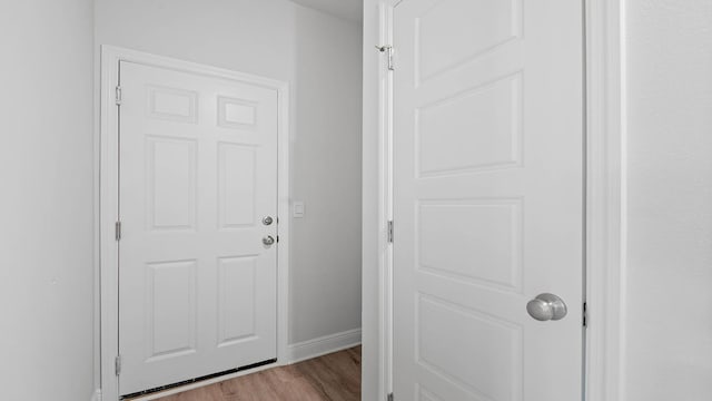 doorway with light hardwood / wood-style floors