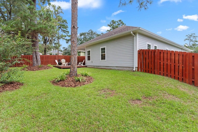 view of yard with a wooden deck