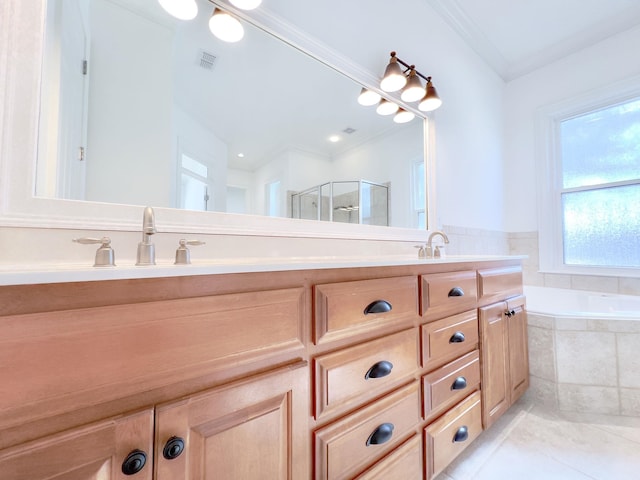 bathroom with tile patterned floors, ornamental molding, plus walk in shower, and vanity