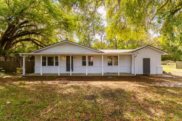 181 E Center St, Perry, FL 32348 - single story home featuring a porch