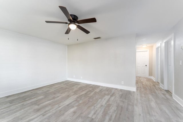 181 E Center St, Perry, FL 32348 - unfurnished room featuring a ceiling fan and light wood-style flooring