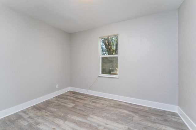 181 E Center St, Perry, FL 32348 - unfurnished room with wood finished floors