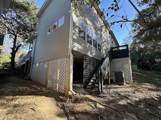 view of side of property featuring cooling unit