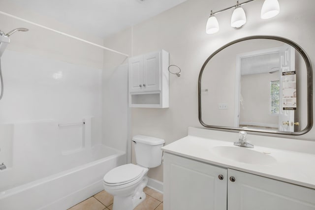 full bathroom with tile patterned flooring, vanity,  shower combination, and toilet