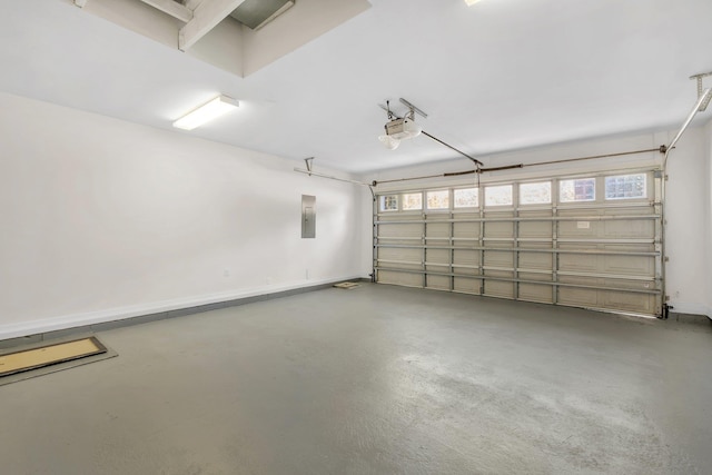 garage with electric panel and a garage door opener