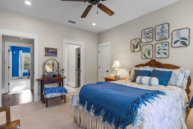 carpeted bedroom with ceiling fan