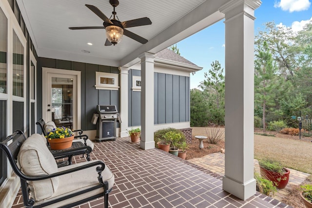 view of patio featuring area for grilling and ceiling fan