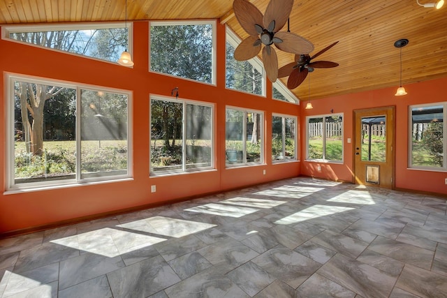 unfurnished sunroom with lofted ceiling and wood ceiling