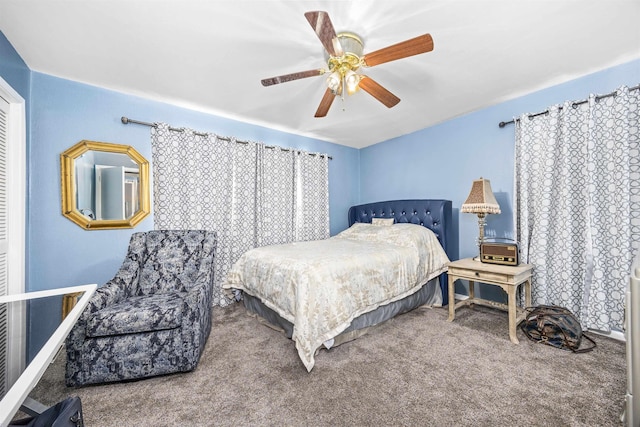 carpeted bedroom featuring ceiling fan