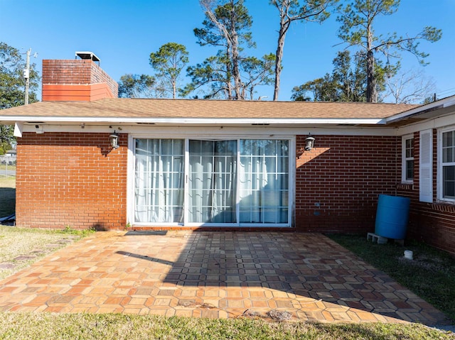 rear view of house with a patio