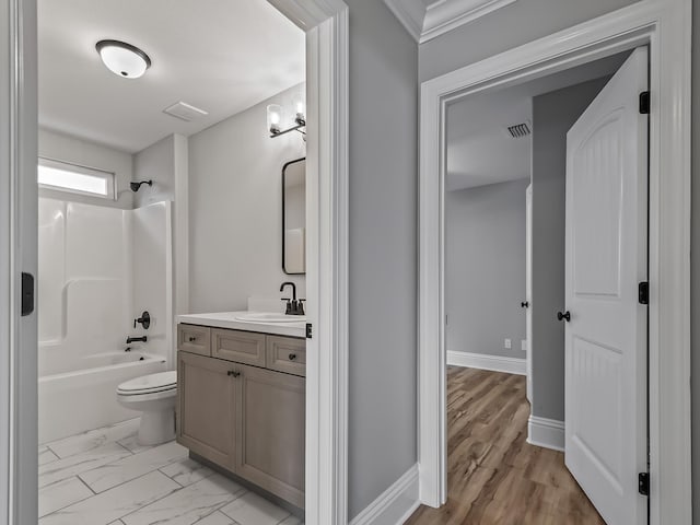 full bathroom featuring shower / washtub combination, vanity, and toilet