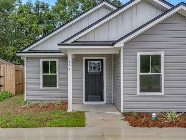67 Broken Bow Trl, Crawfordville, FL 32327 - view of front facade featuring board and batten siding