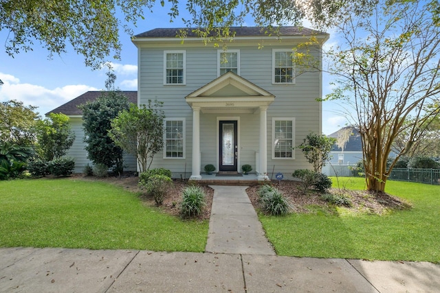 view of front of home with a front yard