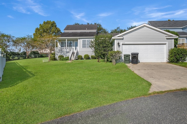 ranch-style home with a porch, a garage, and a front lawn