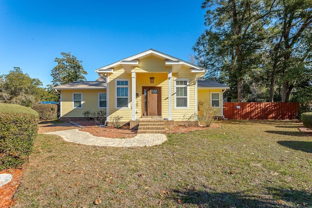 view of front of home with a front lawn