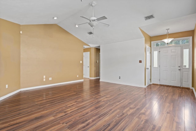 unfurnished living room featuring ceiling fan, dark hardwood / wood-style floors, and lofted ceiling