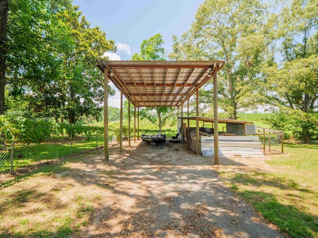 181 NE Biltmore Rd, Madison, FL 32340 - view of property's community featuring a carport and dirt driveway