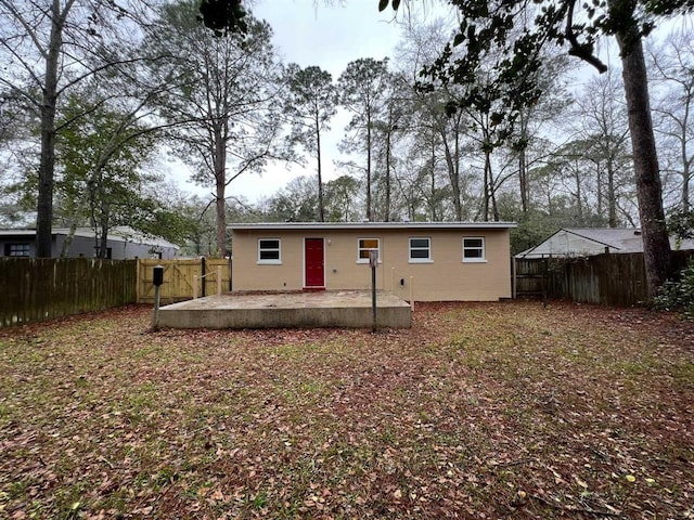 rear view of house featuring a patio area