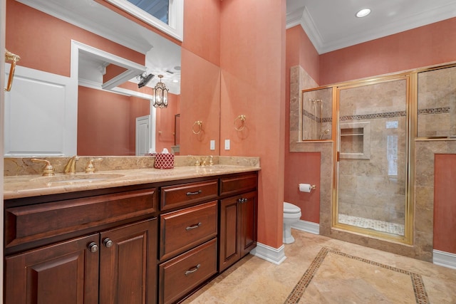 bathroom featuring crown molding, toilet, vanity, and walk in shower