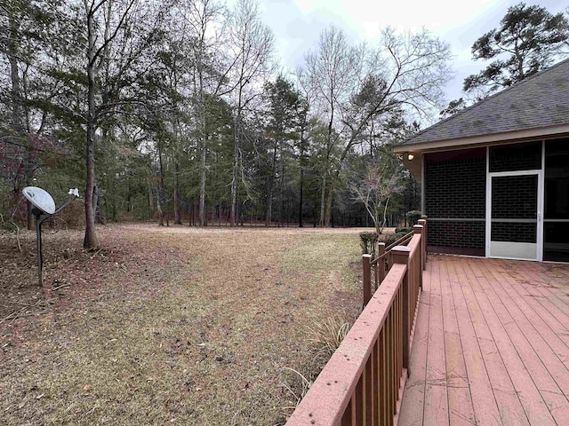 deck with a sunroom