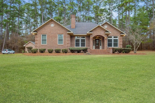 single story home featuring a front yard