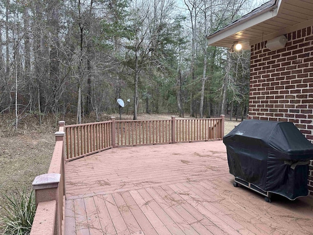 wooden terrace with grilling area