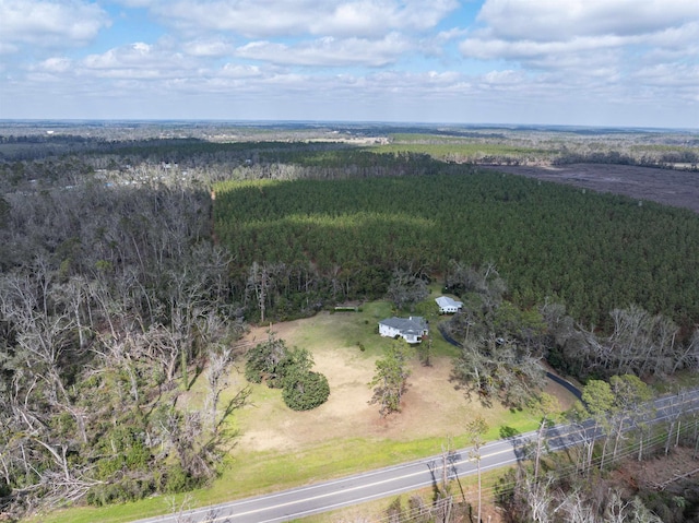 drone / aerial view with a view of trees