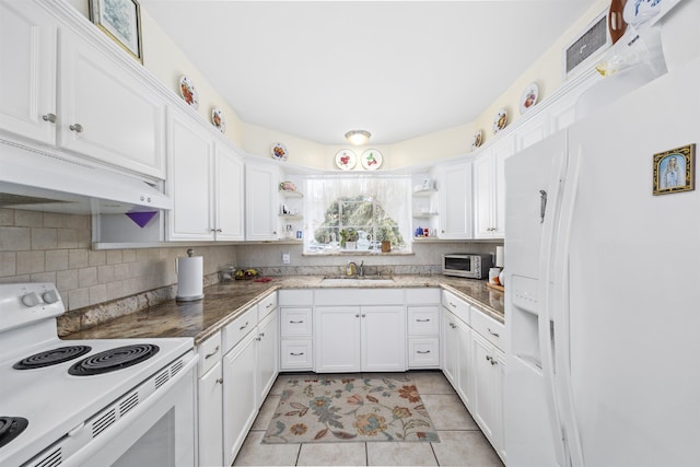 kitchen featuring white appliances, white cabinetry, a sink, and open shelves