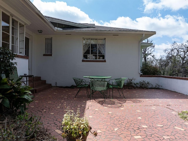 view of patio with outdoor dining area