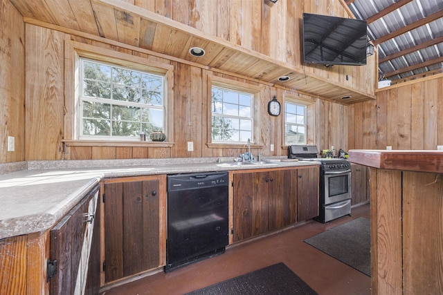 kitchen with stainless steel range oven, black dishwasher, light countertops, and wood walls