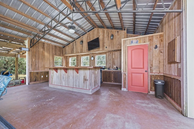 garage with wood walls and metal wall