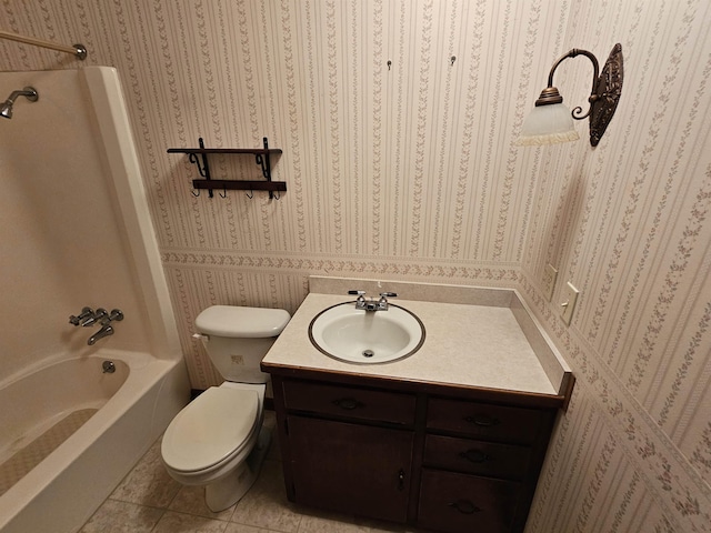 bathroom featuring tile patterned flooring, toilet, vanity, tub / shower combination, and wallpapered walls