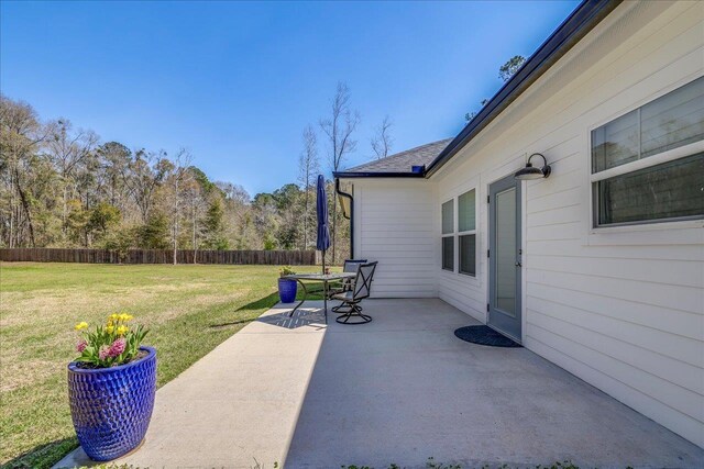 view of patio with fence