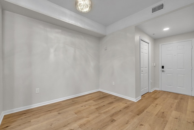 entrance foyer featuring light hardwood / wood-style floors