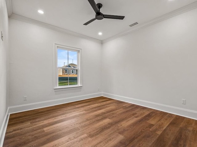 unfurnished room featuring ceiling fan, crown molding, and hardwood / wood-style flooring